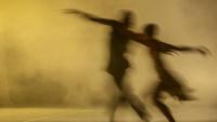 blurry depiction of two modern dancers